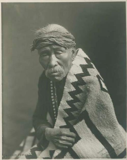 Portrait of a Navajo man wearing a blanket