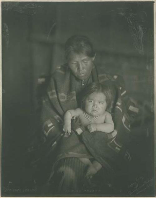 Portrait of a Navajo woman and her child entitled "Indian Madonna"