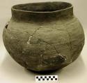 Ceramic jar, round base, plain, mended, reconstructed