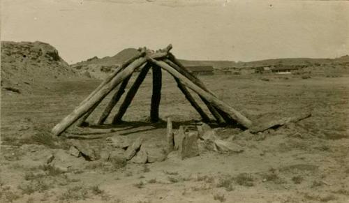 Frame of old hogan at mouth of Canyon de Chelly