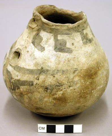 Black on white pottery handled jar