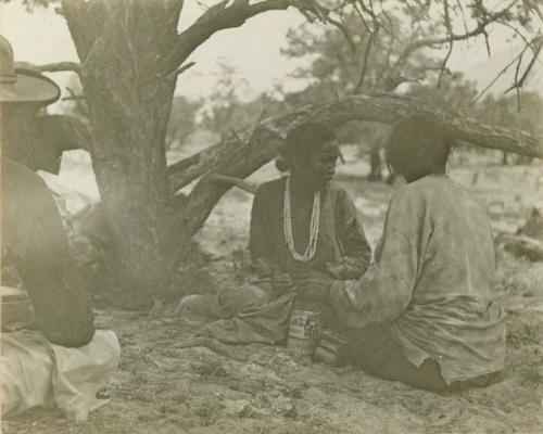 Two Navajo women and a man