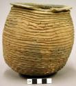 Corrugated pottery jar