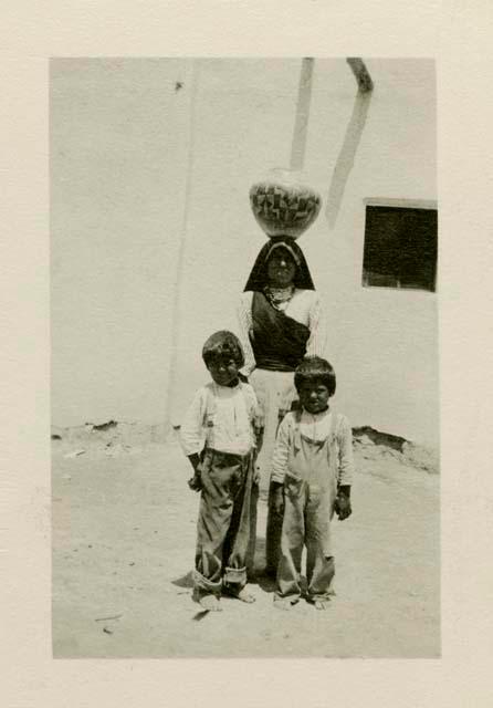 Isleta Pueblo woman and children