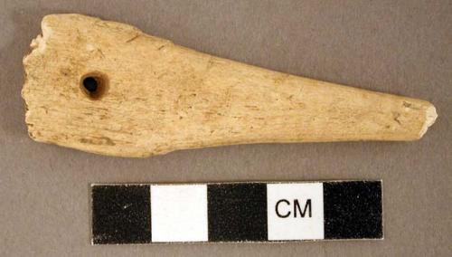 Organic, worked antler fragment, one perforation