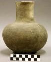 Ceramic vessel, complete, long neck and flared rim, rim sherd missing
