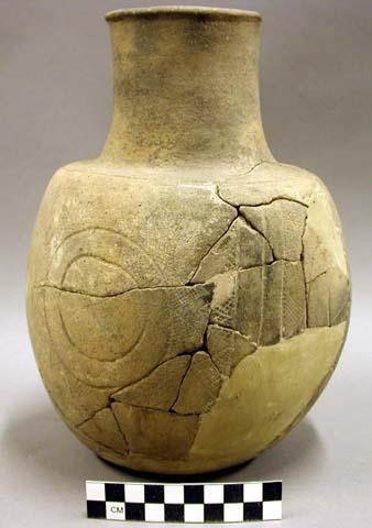 Ceramic complete vessel, mended, incised design around body