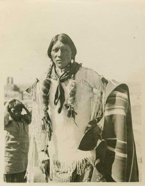 John Concha, our Taos Pueblo friend, wearing white buckskin shirt we purchased