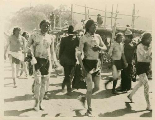 Race over - Runners going to front to prepare for dance which follows