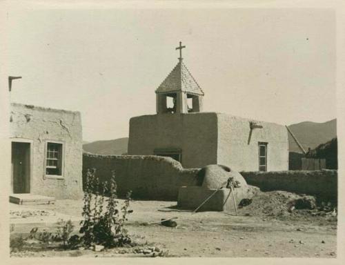 Mexican church and old bake oven - Mexican part of town of Taos.