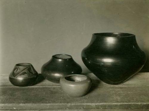 San Ildefonso polished black ware, including one polished black with dull black decoration by Maria Martinez