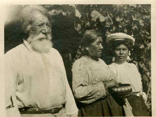 Woman holding basket, Romana Venezula and her husband at Riverside School