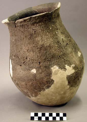 Jar with corrugations crudely smoothed, decorated with regular diagonal stroked