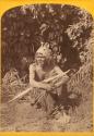 Paiute man sitting on the ground