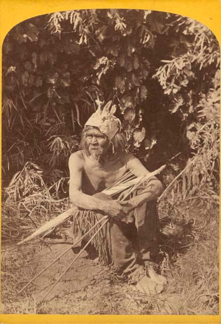 Paiute man sitting on the ground