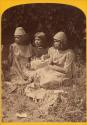 An-ti-naints, Pu-tu-sir and wi-chuts (three women seated next to one another)