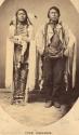 Full-length studio portrait of two Ute chiefs