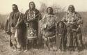 Large group of people photographed in village