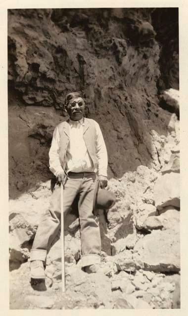 Dick Mahwee, Pyramid Lake shaman, before the cave near Fort Churchill