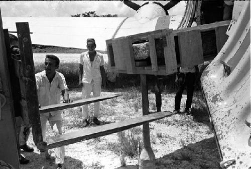 Loading Stela 3 from Machaquila onto DC-3 in Sayexche