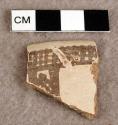 Sherd of pottery milk bowl