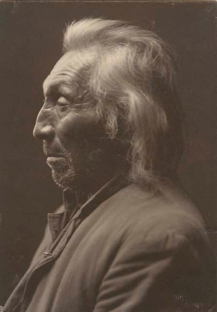 Studio portrait of older man, profile view