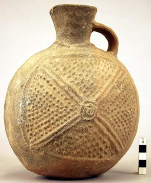 Pottery jar, handle on side, black, stamped ornament