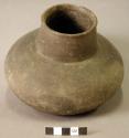 Ceramic vessel, straight neck, rounded base, shell temper