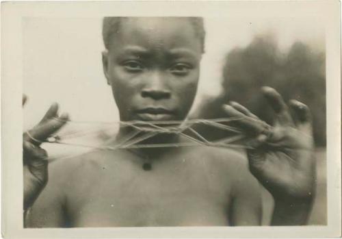 String figures from the Beligian Congo. "Firewood."