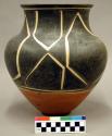Ceramic vessel, funnel shape body, flat base, short flared rim, polychrome.