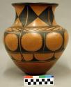 Ceramic vessel, funnel shape body, flat base, short flared rim, polychrome.