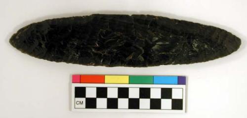 Chipped implement; chipped from black obsidian