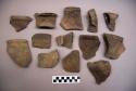 Ceramic, earthenware rim, body, and handle sherds, some incised, some with possible Ramie design, some cord-impressed, some cord-impressed and incised, some undecorated, some with incised handles, shell-tempered