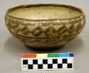 Polychrome pottery bowl - red, brown, yellow