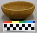 Ceramic bowl, complete, redware, plain.