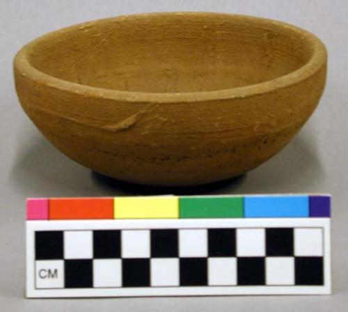 Ceramic bowl, complete, redware, plain.