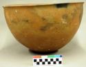 Ceramic bowl, slightly flared rim, plain.