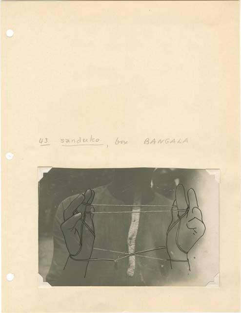 String figures from the Beligian Congo mounted on paper with Davidson's notes.