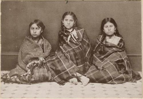 Carrie Anderson, Annie Dawson and Sarah Walker sitting for photo on arrival at Hampton, Va.