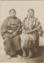 Two women, seated in studio. Sankee and Hatpy