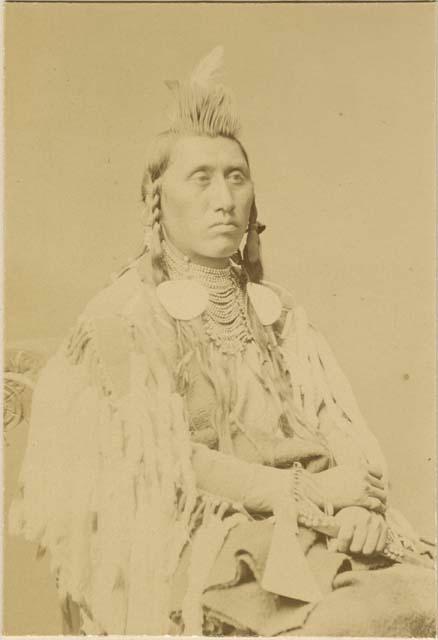 Studio portrait of Pretty Eagle, a Mountain Crow Chief