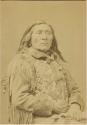 Studio portrait of Two Belly, a Mountain Crow Chief