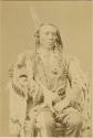 Studio portrait of Old Crow, a Mountain Crow Chief
