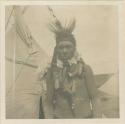 Crow man at Billings, MT where they came from their reservation to trade and dance