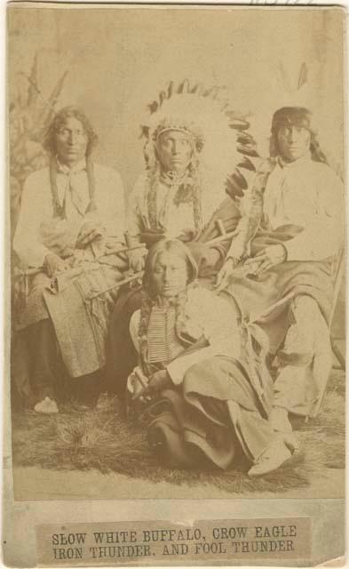 Studio portrait of Slow White Buffalo, Crow Eagle, Iron Thunder, and Fool Thunder