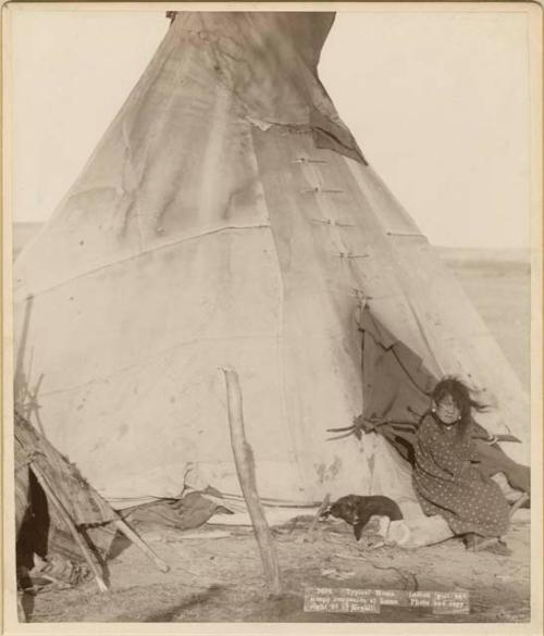 "Typical Home" Indian Girl and sleepy companion at home. Dakota Indians