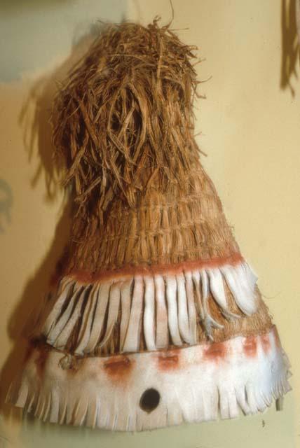 Woman's cap. Woven of dead willow bark and trimmed with buckskin fringed and painted.