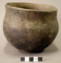 Ceramic vessel, two pairs of perforations around rim