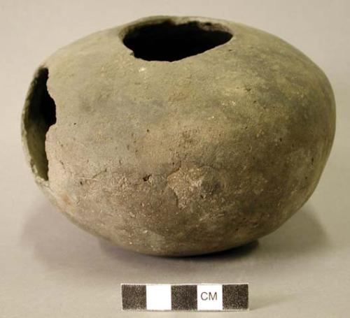 Ceramic vessel, broken at neck, body sherds missing, spalls, flat base, plain.