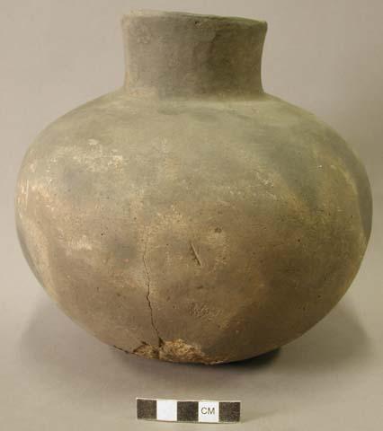 Ceramic jar with medium neck, slightly flared neck, crack in body, spalling on b